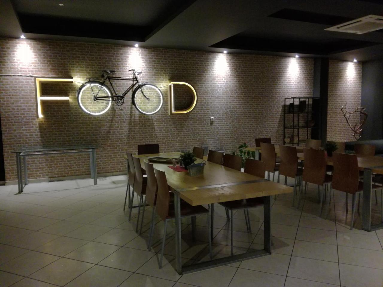 Leonidaion Guesthouse Olümpia Kültér fotó Interior of a restaurant in the Food Hall